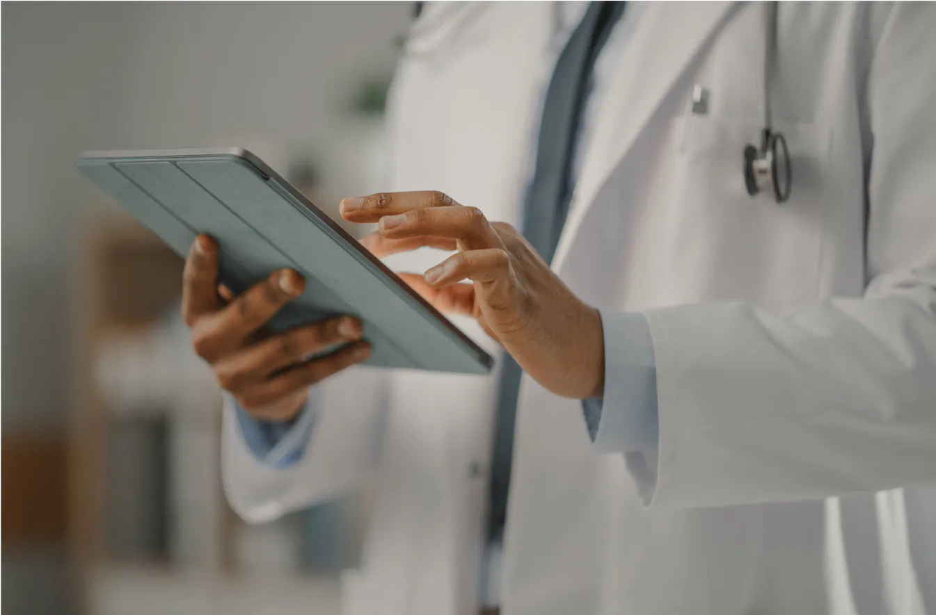 doctor working on a tablet